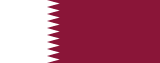 Flag of Qatar: maroon field with a white serrated vertical edge along the left side